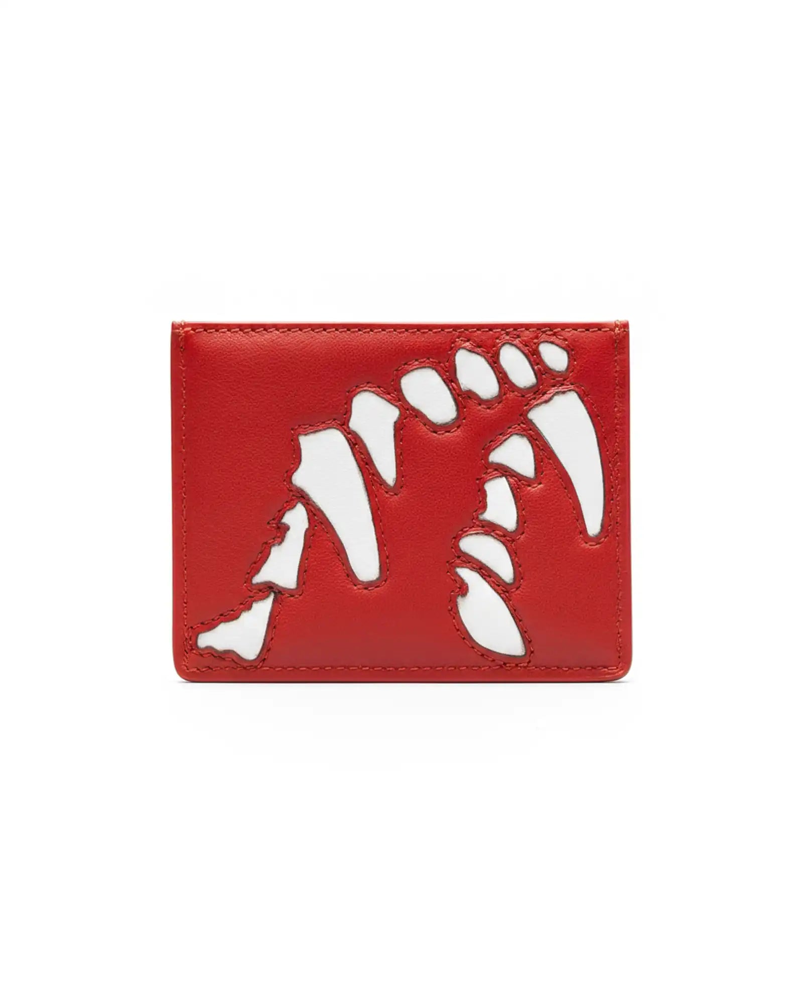 Red cardholder with white fangs cutout on a white background